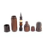 A rosewood cylinder form sewing companion, circa 1850, the top unscrewing to reveal a wooden thimble