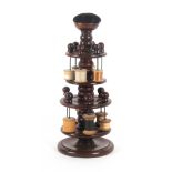 A large turned mahogany reel stand, of four circular tiers, the turned circular base to a baluster