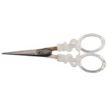 A pair of early 19th Century Palais Royal scissors, the oval section tapering blades to silver