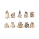 Ten modern silver and white metal thimbles, comprising six hall marked examples, five decorated with