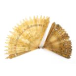 Two Regency period pale horn or tortoiseshell fans, one with ormolu mounted sticks within borders of