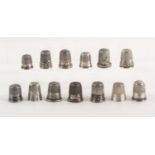 A collection of thirteen American silver thimbles, comprising nine by the Simons family one engraved
