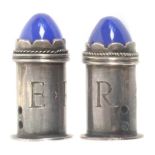 An unusual pair of white metal knitting needle protectors, of cylinder form each engraved 'ER' below