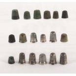 Children's thimbles, comprising eight silver examples, one with frieze depicting an early locomotive