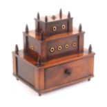 A mahogany and bone reel box and stand in the form of a fortification, possibly French Prisoner of