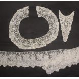 Three pieces of lace, comprising a mixed Brussels front dress panel, 38cms, a Point de Gaze needle