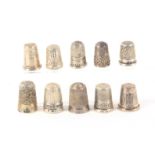 Ten English hall marked silver thimbles, most with decorative friezes. (10) From the collection of
