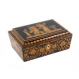 A penwork sewing box of scarophagal form, circa 1810, the sides decorated with urns, flowers and
