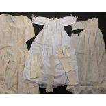 Clothing, etc., comprising two early 20th Century christening gowns, a lady's dress circa 1920