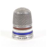 A good example of the silver thimble 'A Stitch For The Red White And Blue', engraved rim below