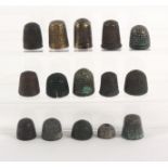 Fifteen 17th Century and later excavated thimbles, brass and bronze. (15) From the collection of