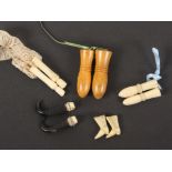 Five pairs of knitting needle protectors, comprising a bone pair in the form of men's boots, 2.5cms,