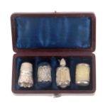 A good four piece silver sewing set in maroon leather case, circa 1830, the rectangular case with