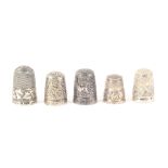 Five attractive British silver thimbles, comprising three blackberry type variants by James Swann,