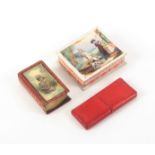 Two needle packet boxes and a lancet case, comprising a red leather gilt tooled book form needle