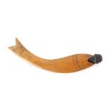 A continental box wood knitting stick, in the form of a fish, of curved form with carved details,