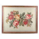 A Victorian wool work tapestry panel, of a spray of roses on fine canvas ground, cloth mount, glazed