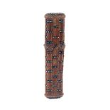 A fine carved walnut and cloute work needle case of oval section carved as woven cane, domed ends,