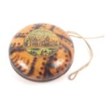 A rare early Tunbridge ware yo-yo, burnt to simulate tortoiseshell, one side with a circular