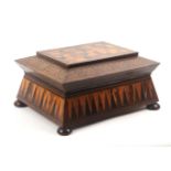 A large Tunbridge ware sewing box labelled for H. Burrows, of sarcophagol form and raised on