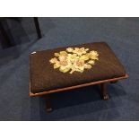 A mahogany needlework stool