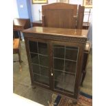 An oak bookcase, 92cm wide, 35cm deep, 116cm high