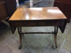 A reproduction mahogany sofa table and a mahogany dressing table