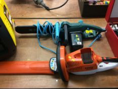 Electric chainsaw and a cordless hedge trimmer