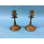 A small pair of ornate Ormolu candlesticks stamped, 16cm height