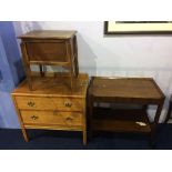 An oak sewing box, oak chest of drawers and tea trolley