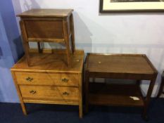 An oak sewing box, oak chest of drawers and tea trolley