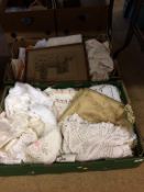 Two boxes of linen etc.