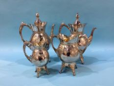 An engraved silver plated four piece tea service