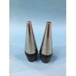A pair of rosewood and stainless steel salt and pepper