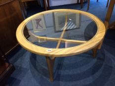 A teak circular Stateroom by Stonehill coffee table, with glass insert, 88cm diameter