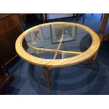 A teak circular Stateroom by Stonehill coffee table, with glass insert, 88cm diameter