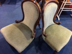 A pair of Victorian style nursing chairs