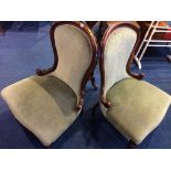 A pair of Victorian style nursing chairs