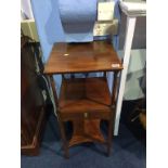 A 19th century mahogany two tier table, with single drawer