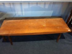 A long teak coffee table