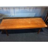 A long teak coffee table