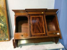An Edwardian mahogany wall mounted breakfront cabinet, 74cm wide