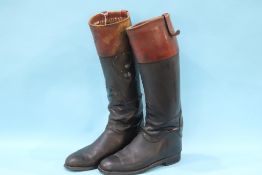 A pair of leather riding boots