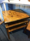 An Art Deco square top two tier table