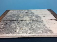 A painted pine table, with North East ordnance survey map on the top, 66cm width