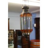 An unusual and decorative pulley driven ceiling light, with clear glass panels and two rows of two