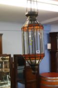 An unusual and decorative pulley driven ceiling light, with clear glass panels and two rows of two