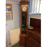 An oak cased electric clock by Sir W.H. Bailey and Co. Ltd, Albion Works, Salford, Manchester,