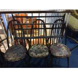 An Ercol delft rack and three hoop back chairs