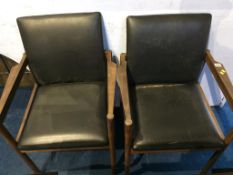 A pair of Vanson teak carver chairs